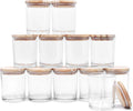 Twelve clear 7 oz candle jars with wood lids