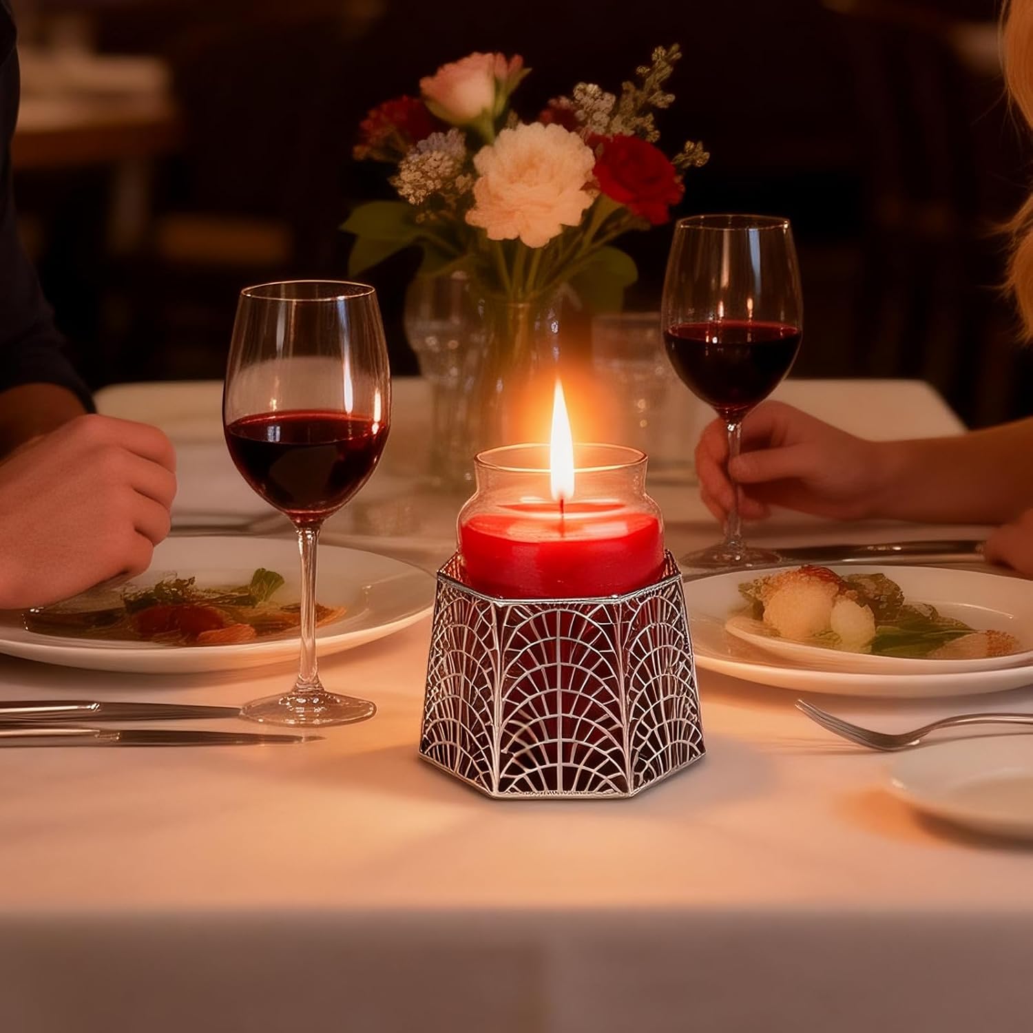 Silver candle holder on a dining table