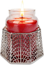 Silver holder supporting a jar candle