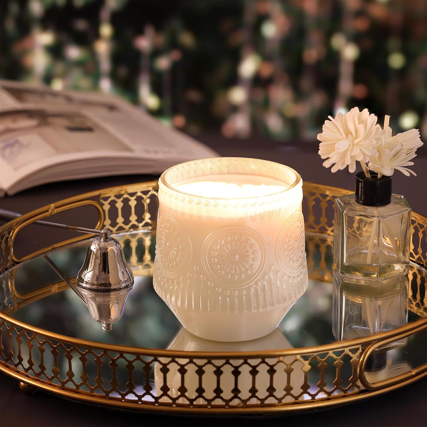 Floral candle jar styled on a vanity tray