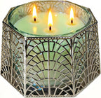 Silver holder fitted with a three-wick candle